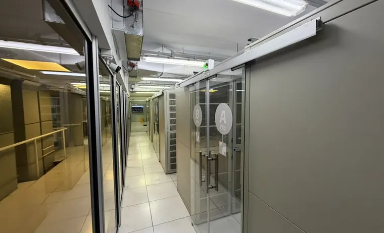 Data room aisle with private cages per row